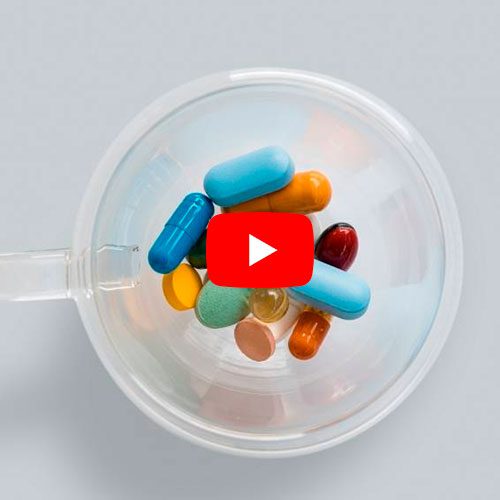 A imagem mostra um conjunto de pílulas.