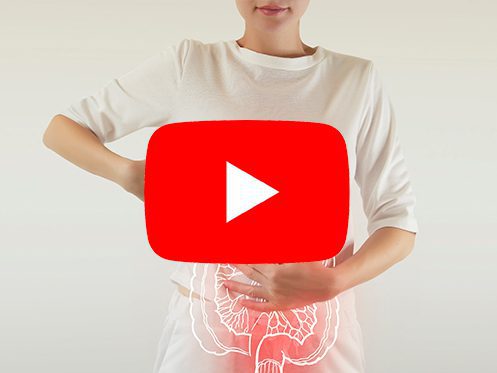 a imagem ilustra uma pessoa com a mão do lado direito do corpo e a ilutração de um sistema digestivo